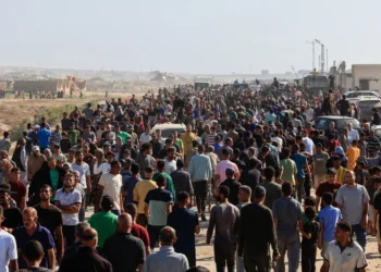 Chaos erupts on first day of US-backed aid distribution in Gaza after weeks of hunger