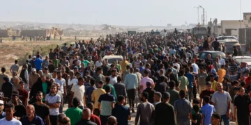 Chaos erupts on first day of US-backed aid distribution in Gaza after weeks of hunger