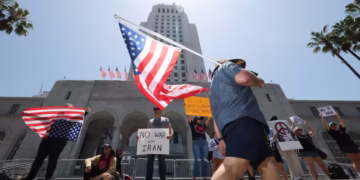 Two activists fled Iran for the US. They disagree on the strikes against their home country