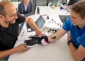 Researchers develop smart robotic glove to restore movement, touch in paralysis patients