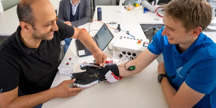 Researchers develop smart robotic glove to restore movement, touch in paralysis patients
