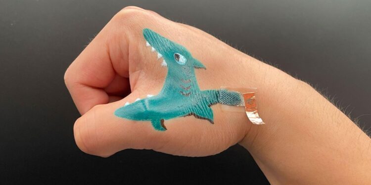 Scientists invent painted e-tattoos that could turn to monitoring electrocode